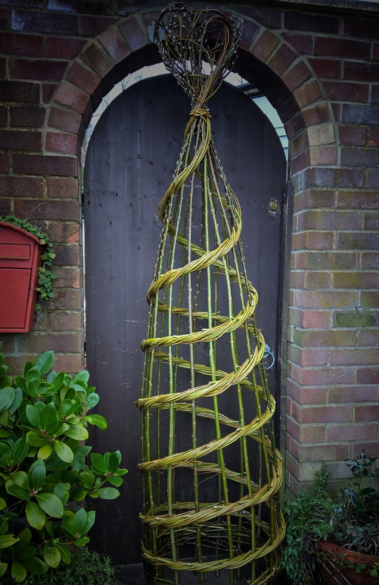 Plant support willlow weaving workshop at Holkham in north Norfolk